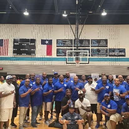 Brothers at the chapter's Back-to-School Fair