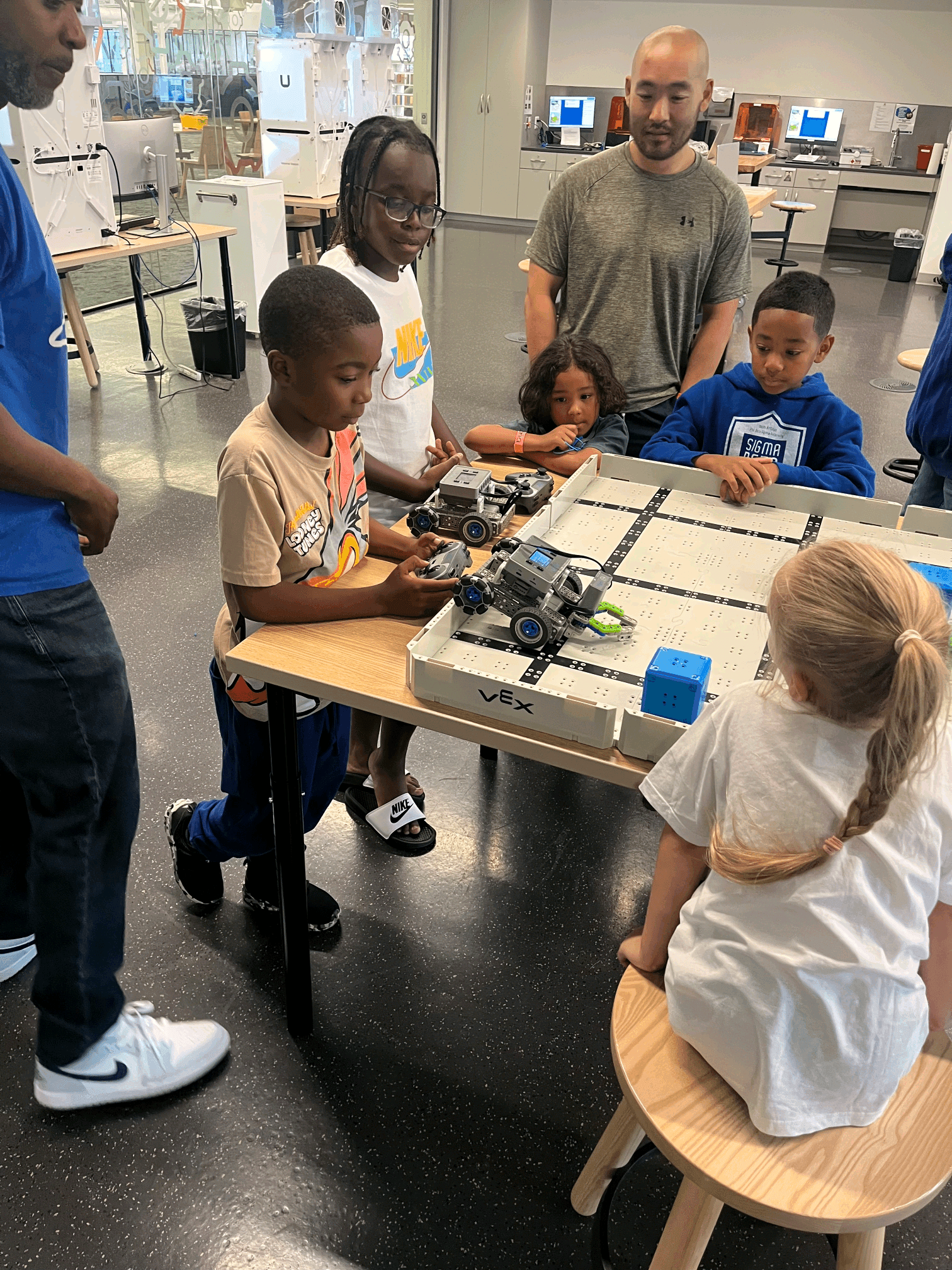 A Sigma Beta Club member with his STEM day certificate